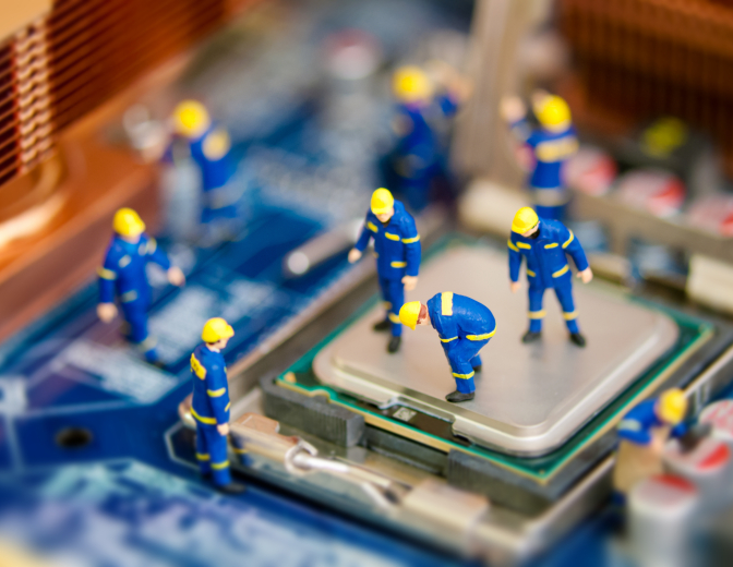 Tiny technicians fixing a small error
